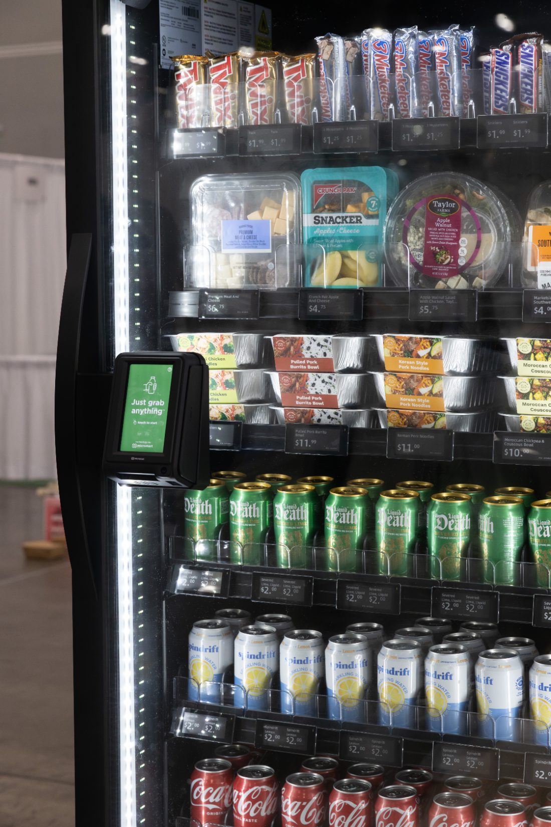 Shelves stocked with healthy snacks, fresh meals and drinks