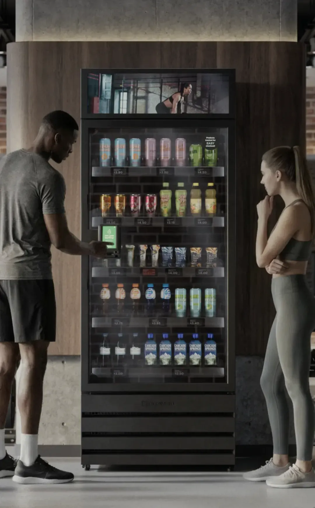 AI vending machine placed in a modern gym with members nearby